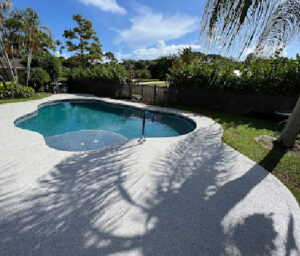 pool with concrete pool deck